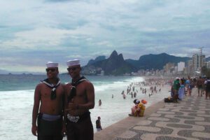 Two Men at the beach in Rio de Janeiro during the carnival