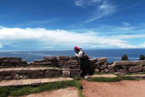 Man overlooking Lake Titicaca on the Taquile island - seen on a daytrip from Puno to the Uros Islands and Isla Taquile