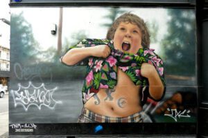 Mural by JXC - best street art in London in the Camden district.